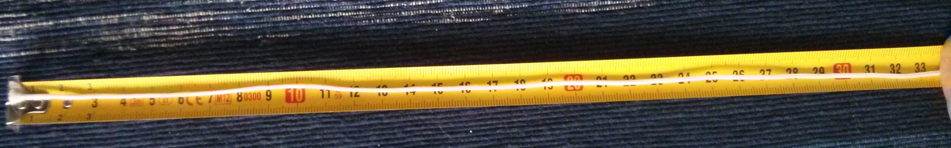El trozo de cordón utilizado, medido sobre una cinta métrica
